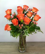 Orange Roses and Berries Vase